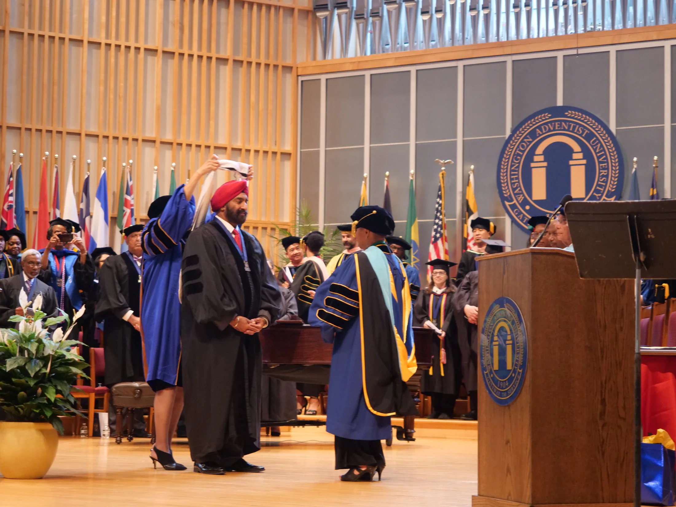 Across the commencement stage